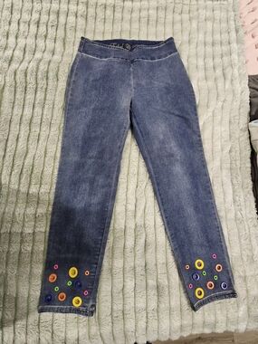 Woman's Vintage Blue Denim Jeans with Colorful Grommet Accents